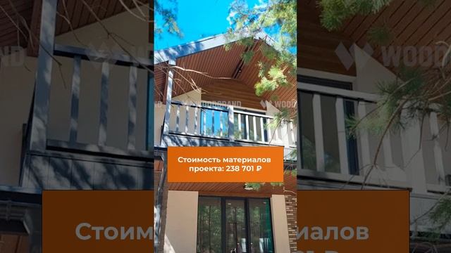 Двухэтажный дом с террасой и балконом из ДПК