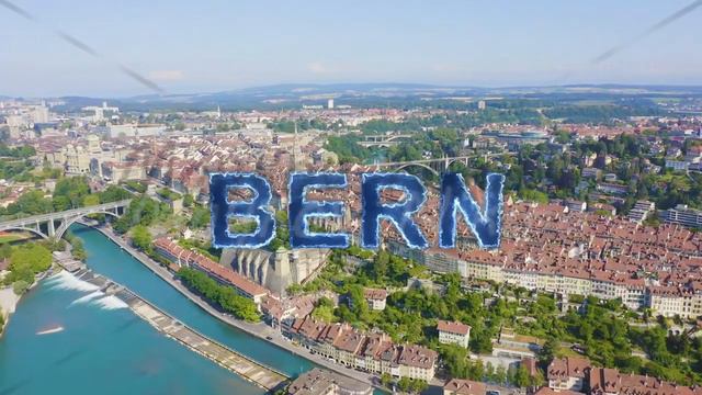Inscription on video. Bern, Switzerland. Historic city center, general view, Are river. Blue lights смотреть онлайн