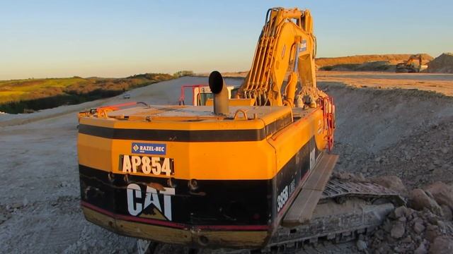 ? High productivity - Caterpillar 385B loading Volvo A40F and Bell B45D - Part 2 смотреть онлайн