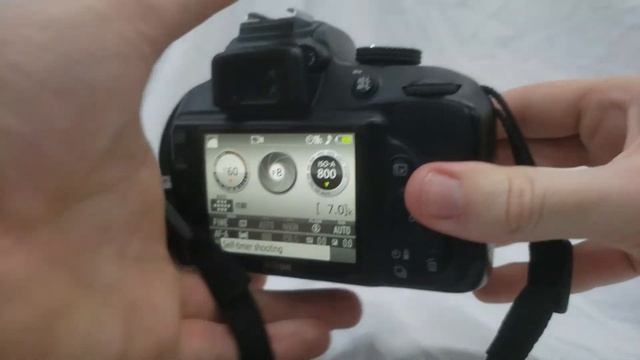 How to turn on the Self-Timer on the Nikon D3400 смотреть онлайн