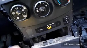 как разобрать центральную часть панели тойота королла е150.