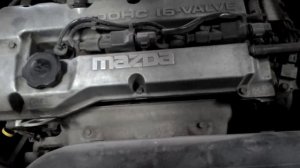 Прогоревшая прокладка приемной трубы Mazda Familia 323 ZL-DE