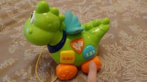 Игрушка музыкальный дракон Chicco