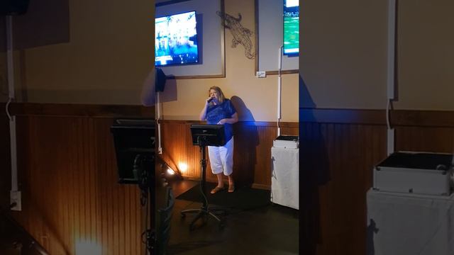 Singing a karaoke version of "Make The World Go Away" originally performed by Eddy Arnold & others смотреть онлайн