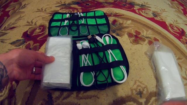 получил посылку....сумка под мелочи.. шнуры зарядки и т.д..... смотреть онлайн