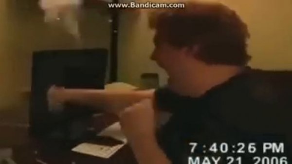 man punches computer because of scary maze game