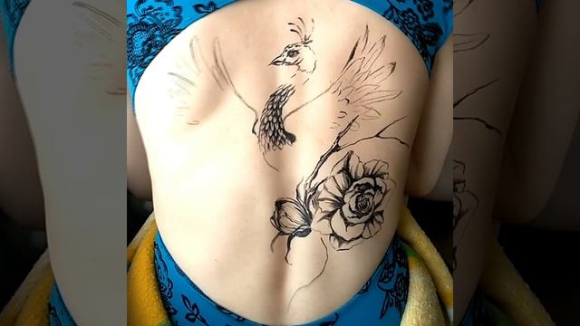 Body art photo shoot. Drawing on the back of a girl. Бодиарт на спине у девушки, жар-птица смотреть онлайн