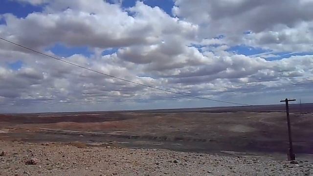 Антенны сотовой связи на вершине водокачки Коунрада - виды на отвалы, посёлок и степные раздолья смотреть онлайн