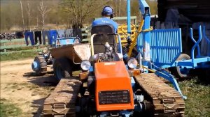 Самодельный лесовозный прицеп с гидроманипулятором "EXPVIK  4.00" для мини-трактора МТЗ-132Н.