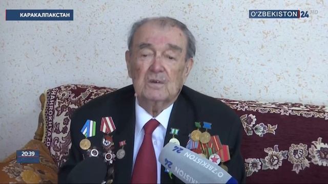 Вручение денежных вознаграждений и подарков ветеранам