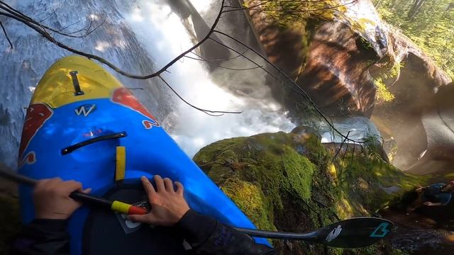Kayaking through a crazy 50ft Tunnel Waterfall. смотреть онлайн