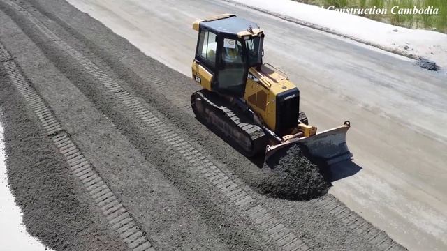 Continue Project Road Construction CATERPILLAR D3K Dozer Spreading Gravel Build Foundation Road смотреть онлайн