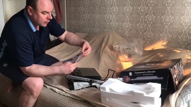 Распаковка электрогриля Zigmund&Shtain с платформы Озон смотреть онлайн