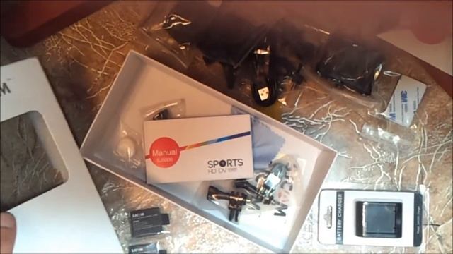 Распаковка камеры для копа SJCAM 5000 WI FI смотреть онлайн