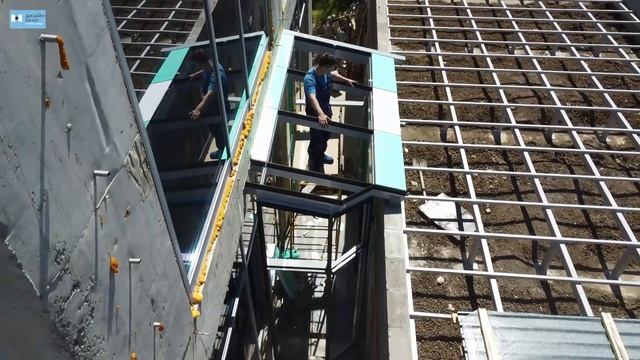 Переход между домом и гаражом из стоечно-ригельной системы ALUTECH ALT F50. смотреть онлайн