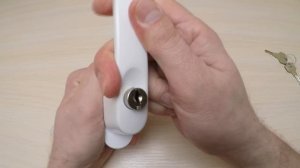 Ручка с ключом и кнопкой для пластикового окна.