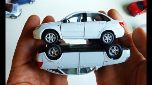 Открываю 2 модельки машинки Лада / Lada Гранта и Приора распаковка и обзор. Про машинки.