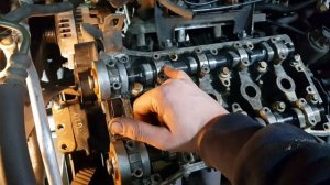 Расположение крышек подшипников распределительных валов двигателя F14D F16D. Шевроле Aveo Дэу Nexia