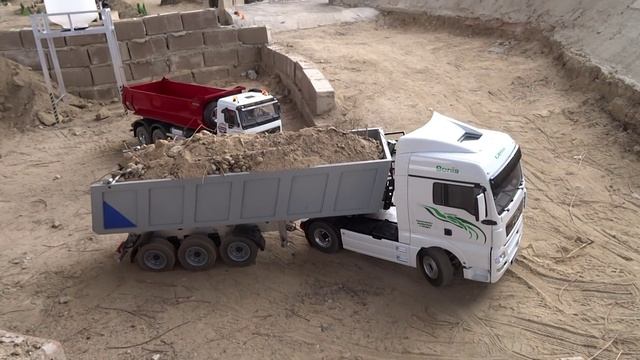 Awesome R/C trucks and machines in action of the construction site. смотреть онлайн