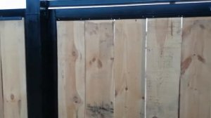 Забор из профильной трубы и доски