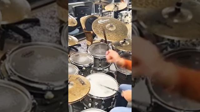 Drumming a groove over an early Phil Collins song смотреть онлайн