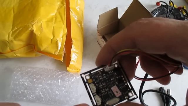 Матрицы камер видеонаблюдения,широкоугольные объективы,посылка из кита. смотреть онлайн