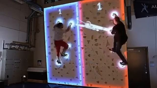 Climball is an augmented rock-climbing-wall plus air hockey game смотреть онлайн