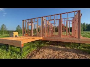 Каркасный дом на сваях с мансардным этажом