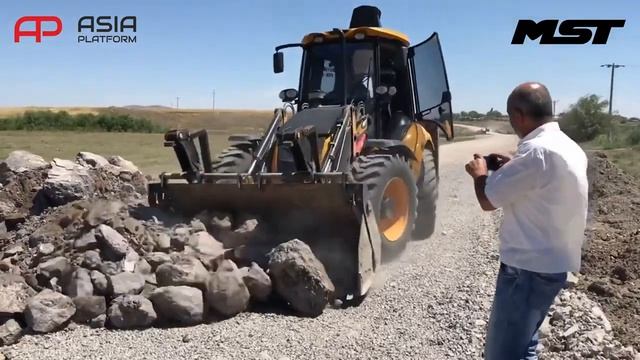 ЭКСКАВАТОР ПОГРУЗЧИК MST M644 plus смотреть онлайн