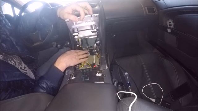 Removing the Armrest and Lower Console Panel from an '06-07 Aston Martin V8 Vantage смотреть онлайн