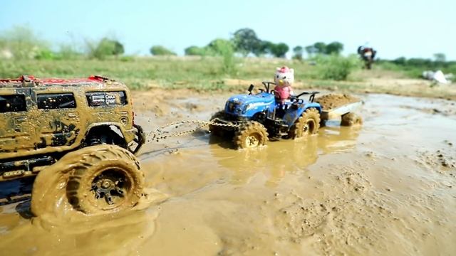 Машинка на радиоуправлении тянет трактор из грязи смотреть онлайн