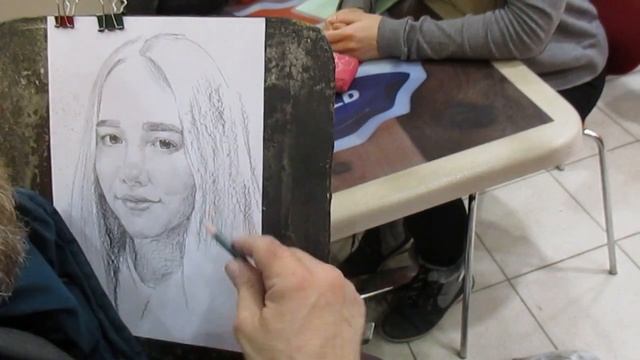 Художник пишет портрет с меня