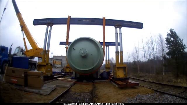 Выгрузка с ж/д транспортера и перегрузка на автопоезд компенсатора давления, 200 тонн. смотреть онлайн