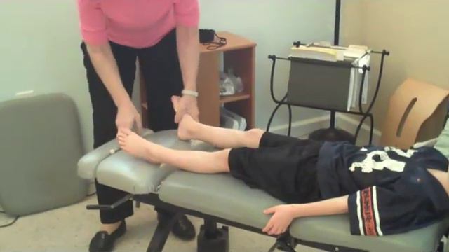 Adjusting A Child | Pediatric Chiropractor | Greenville SC