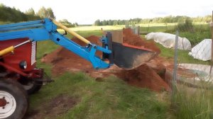 Трактор Т 25 с самодельным навесным оборудованием.