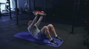 Подъемы корпуса с блином/ Weighted sit up