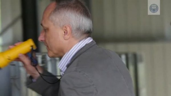 How does the OPCW monitor compliance with the Chemical Weapons Convention?