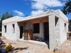 Строительство "коробки" дома из газобетона в стиле Хай-Тек с плоской кровлей и техническим этажом.