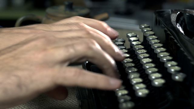 Vecteezy_writer-types-on-a-typewriter_1624959--online-audio-convert.com