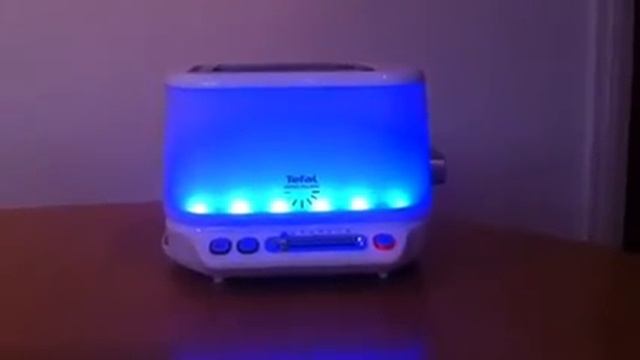 Tefal Toast 'n Light Toaster TT571015 / TT5700 смотреть онлайн