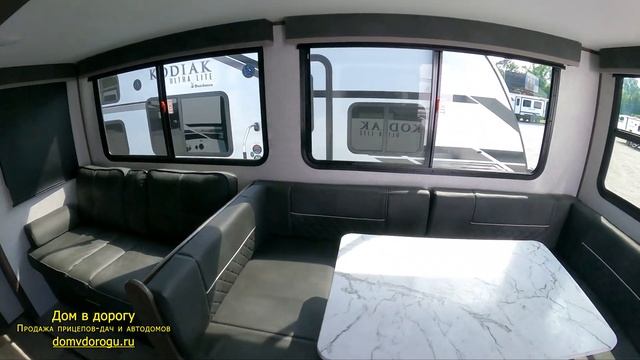 Круче уже не бывает. На 9 спальных мест. С внешний кухней и электролапами Kodiak Ultra Lite 296BHSL смотреть онлайн