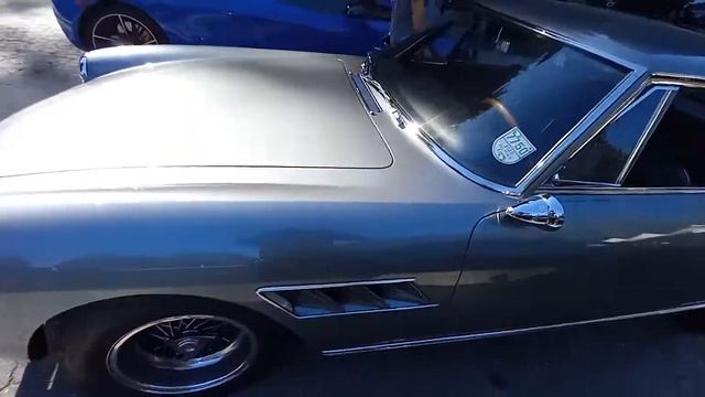 classic Ferrari outside of Alice's. смотреть онлайн