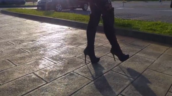 catwalk wearing the new summer collection, boots, corset, leather and vinyl leggings