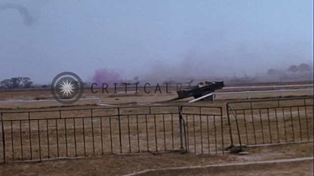 Army helicopters at Phu Tho Racetrack during Vietnam War in Saigon. HD Stock Footage смотреть онлайн