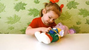 Интерактивная игрушка. Лунтик учит одеваться.
