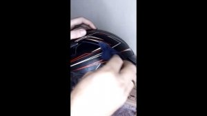 Чистил мотошлем от наклеек и липкого слоя и испортил.
