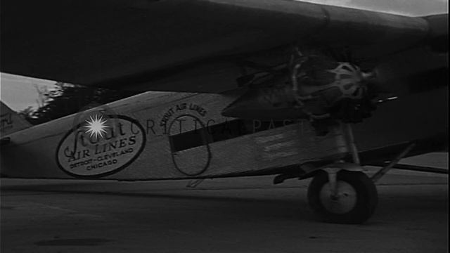 Passengers board a stout airlines Ford Tri-motor plane in United States HD Stock Footage смотреть онлайн