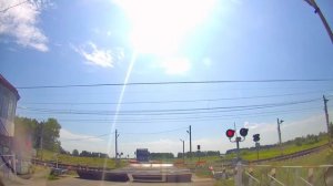 Железнодорожный переезд со шлагбаумом под Зырянкой