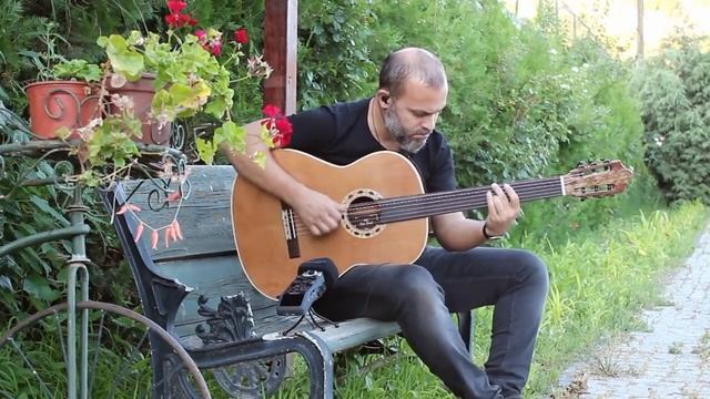 Cenk Erdogan  Plays Baritone Fretless Acoustic Guitar