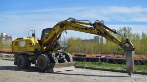 Экскаватор ЕК-14-30 ТВЭКС с гидромолотом (дятлом). Работа по демонтажу бетона.